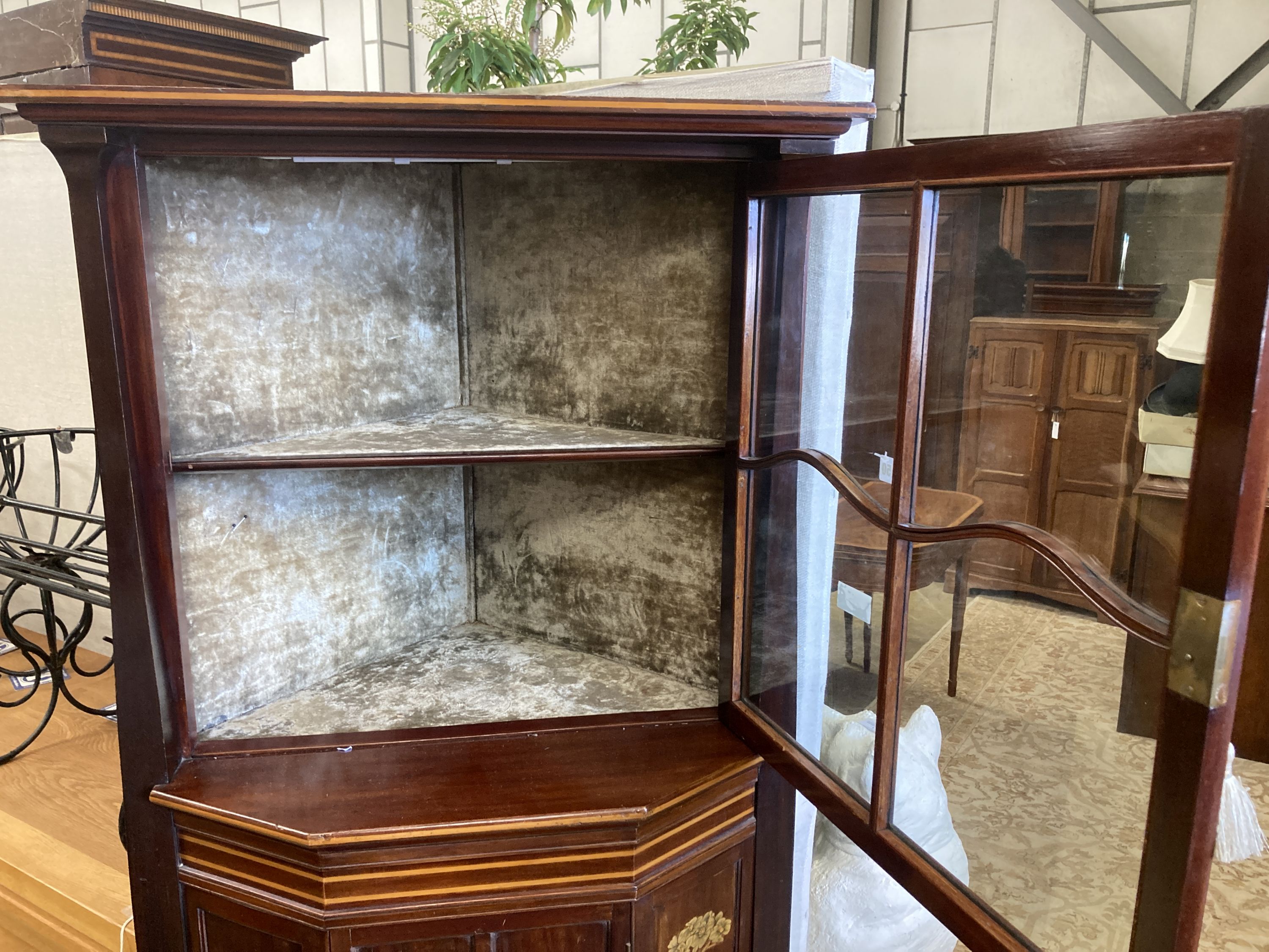 A late Victorian Art Nouveau marquetry inlaid and cross banded mahogany standing corner cabinet, width 74cm, depth 53cm, height 173cm